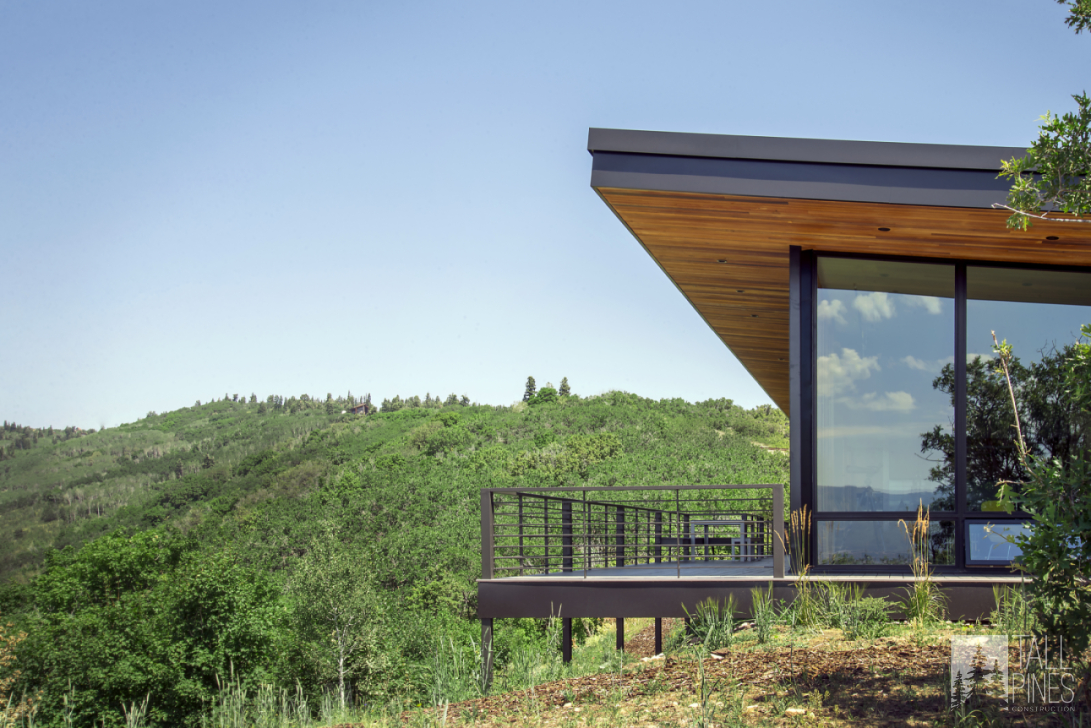 Day view highlighting the modern architecture of the Redhawk House in Park City
