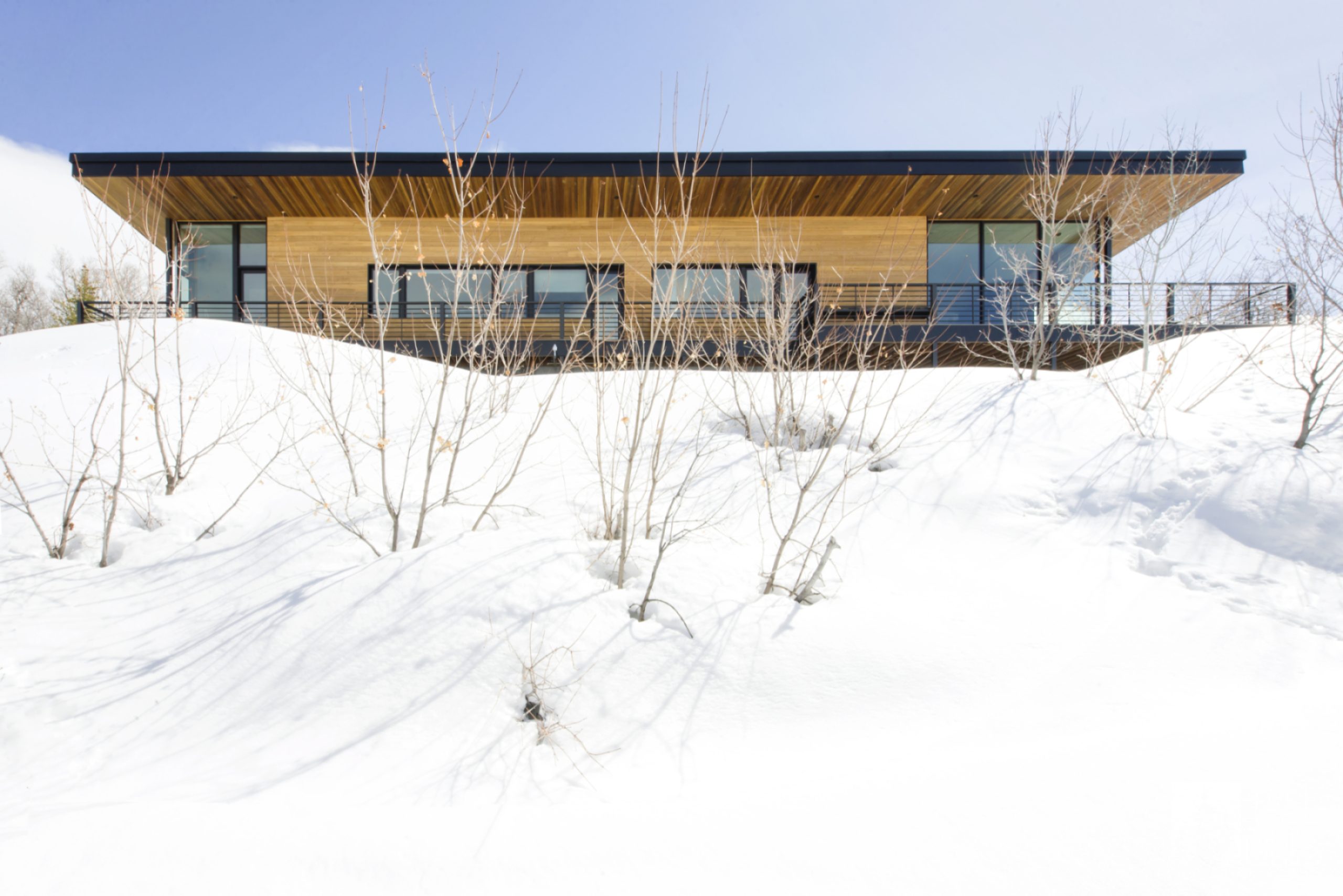 Panoramic view capturing the beauty of the Redhawk House's exterior and surroundings