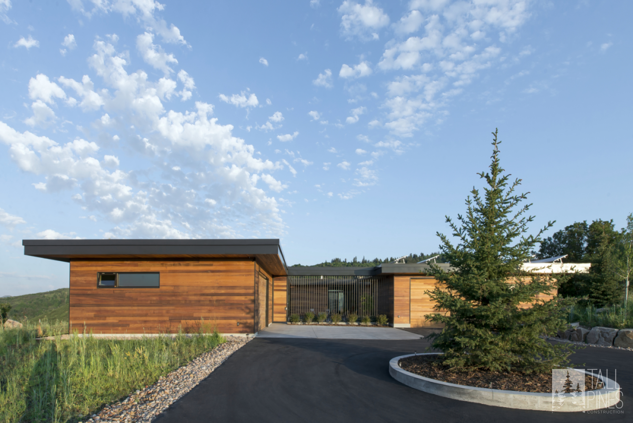 Modern exterior view of the Redhawk House in Park City with stunning architecture and surroundings