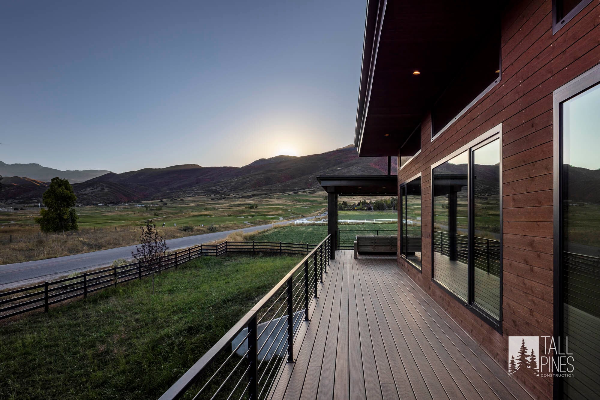 View of mountains from on the deck on custom built home in utah at the Reservoir Retreat, a modern contemporary custom-built home in Midway, Utah by Tall Pines Construction.