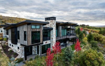 Exterior of a luxury Park City custom home showcasing mountain contemporary architecture, natural materials, and scenic hillside views.