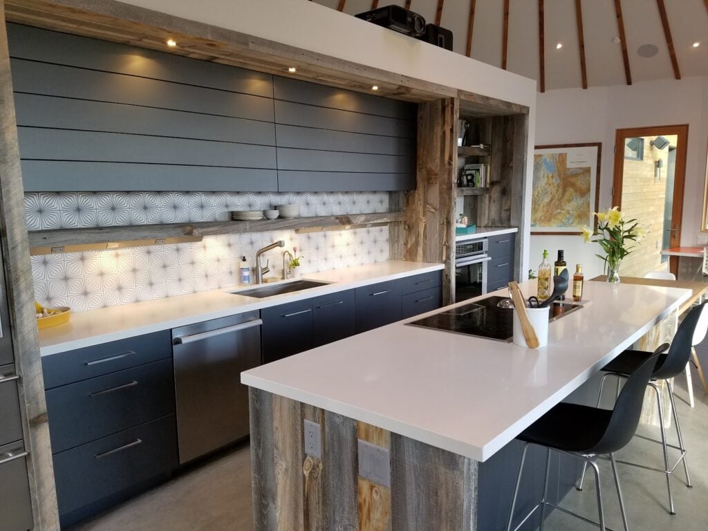 Contemporary custom kitchen inside a luxury Park City yurt with premium finishes, open-concept design, and mountain-inspired materials.